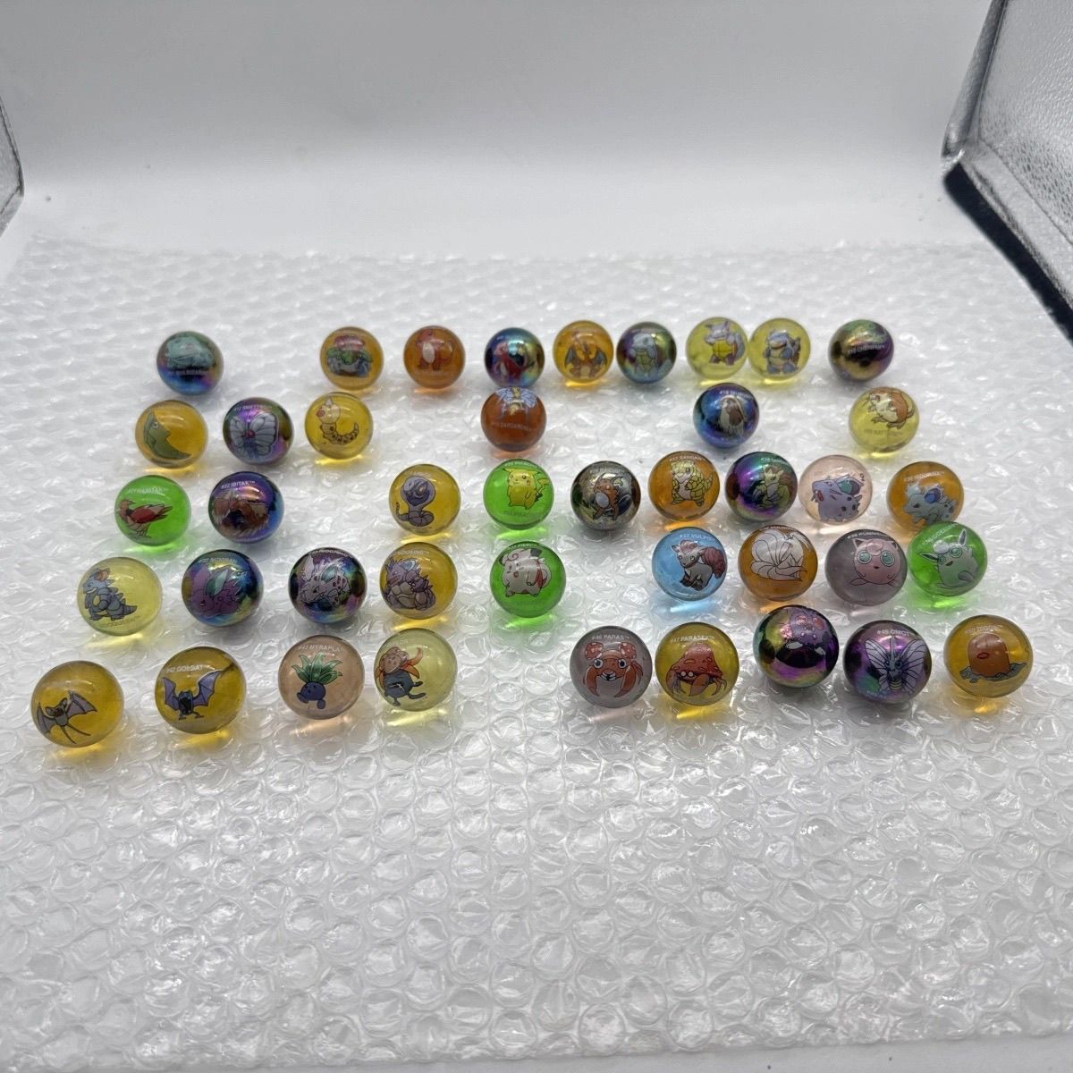 Marchandises Pokémon officiell - Vintage Collectible Marbles avis et prix