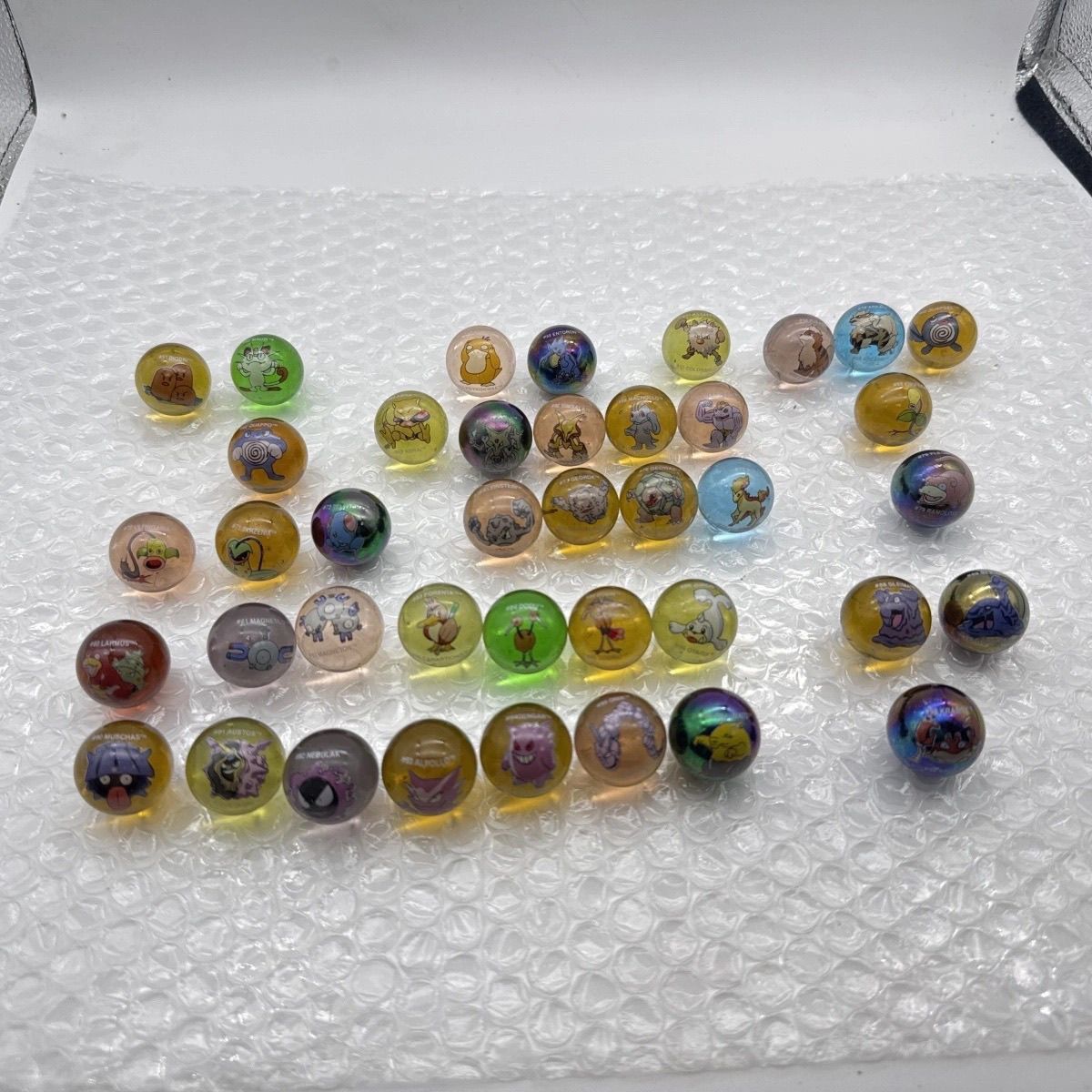 Marchandises Pokémon officiell - Vintage Collectible Marbles avis et prix