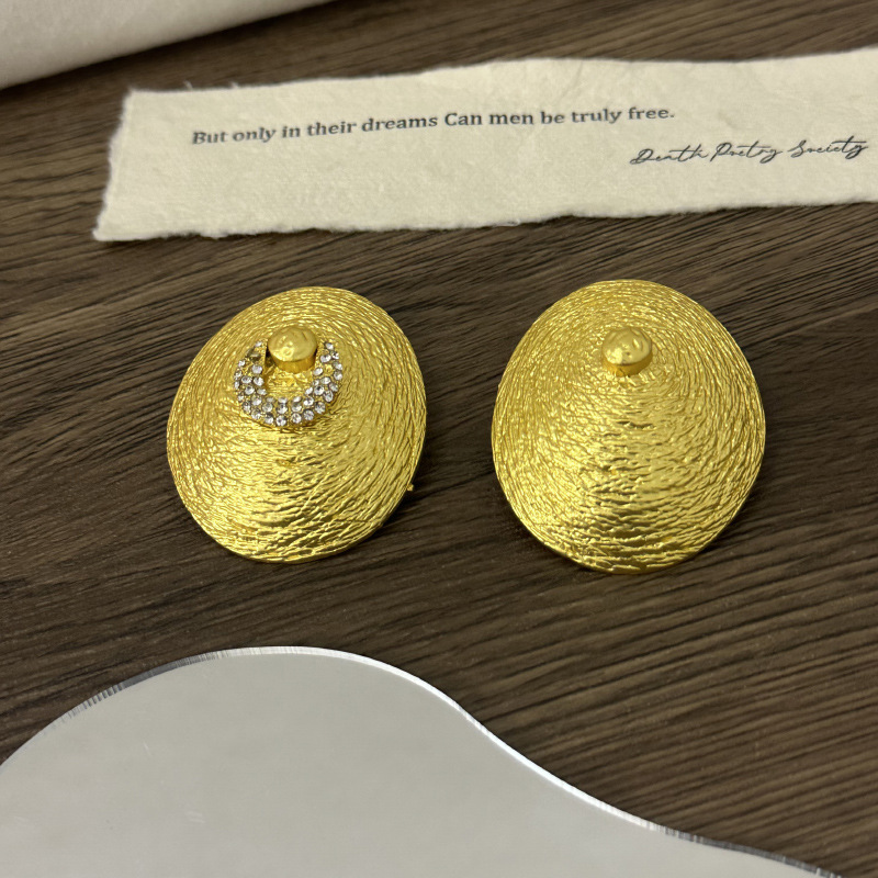 Grandes boucles d'oreilles ron - Vintage Collectible Show avis et prix