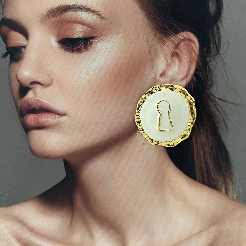 Boucles d'oreilles rondes en a - Vintage Collectible Show avis et prix